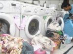 modal bisnis laundry